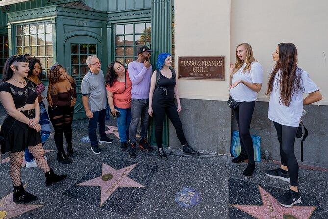 LA Walk of Fame 100 Years of Hollywood Tour By Junket - Handprints, hoofprints, and pawprints in the sidewalk