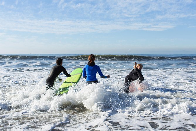 Private Surf Lesson with Instructor, Board, & Wetsuit - Catching your first waves